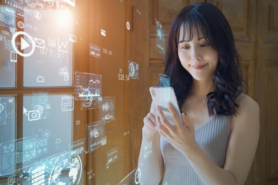 jovem com celular informacoes sobre investimentos financas pessoais bancos instituicao financeira.jp
